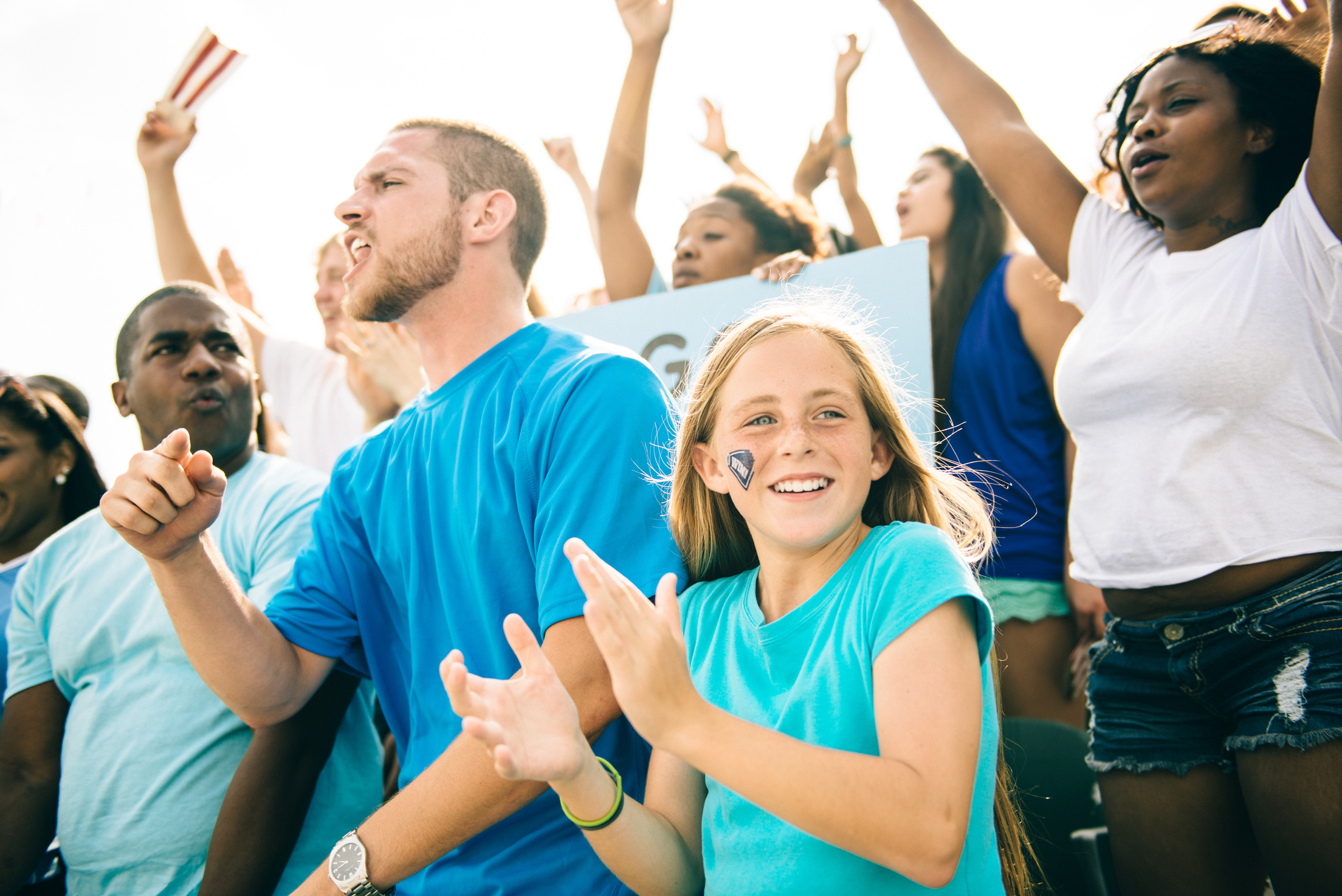 Fans cheer on sporting event